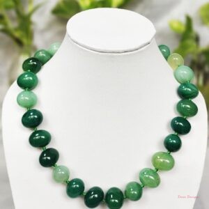 Translucent shades of ovoid-shaped sea green coloured Onyx tumbles come together in this knotted 19” single strand necklace, with a strong spring-ring clasp for durability. DN0018