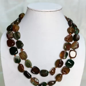 Babbling Brook - Delightful irregular tumbles of Onyx in shades of mossy green and bark brown mottled with flecks of white come together in this knotted 36” single strand necklace. DN0028