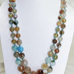 Desert Sky - Knotted 18” double strand of dragon-veined Onyx beads graded in size, in all shades of tropical sky blues and romantic desert browns splotched with whites, orange, and mossy green. DN0038