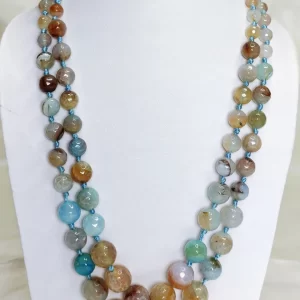 Dusty Diva - Knotted 18” double strand of dragon-veined Onyx beads graded in size, in all shades of tropical sky blues and romantic desert browns splotched with whites, orange, and mossy green. DN0040