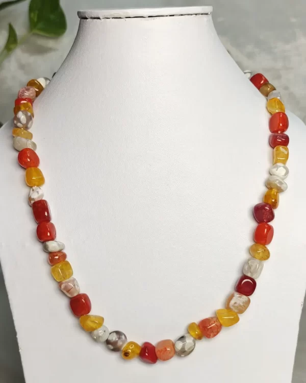 Mango Chutney - DN0358 - Warm, fruity, juicy, and lip-smacking strains of Mama’s mango chutney come together in this 19” necklace of vividly coloured tumbles of agate, onyx, feldspar, iolite, and quartz.
