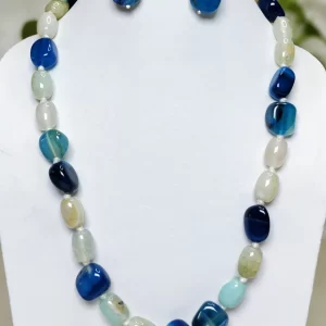 Ice Blue - DN0484 - Dark and light icy blue Onyx tumbles in a 19” creation.