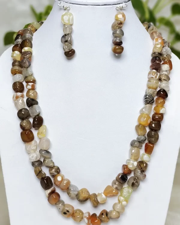 Stone Garden – DN0512 - Spectacular all-the-shades-of-brown Onyx tumbles in a 40” chain linked wonder piece.