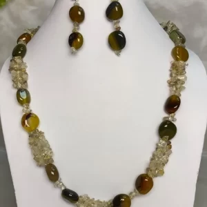 Memsahib - DN0585 - Three strands of Rock Crystal chips pool up with mossy green and woodland brown Onyx tumbles to form this refined 19” necklace.